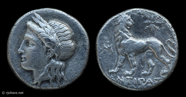 [Image: Silver head-of-Apollo coin from ancient Miletus.]